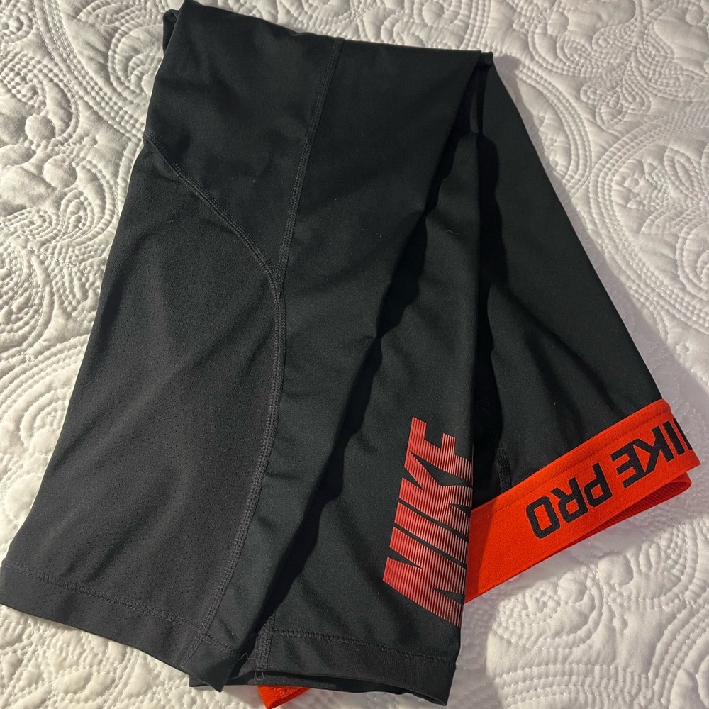 Nike Pro Women’s Dri-Fit, Capri Leggings, Black with Red Logo, Size Medium